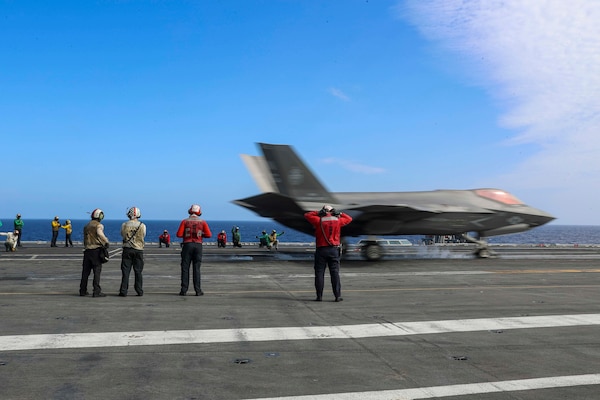An F-35C Lightning II, assigned to the "Black Knights" of Marine Fighter Attack Squadron (VMFA) 314, launches from the flight deck of the Nimitz-class aircraft carrier USS Abraham Lincoln (CVN 72).