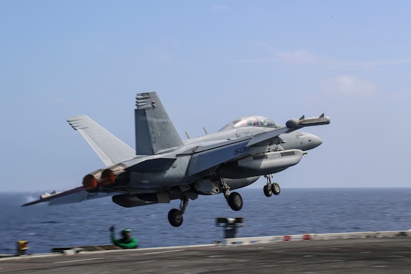 An EA-18G Growler, assigned to the "Wizards" of Electronic Attack Squadron (VAQ) 133, launches from the flight deck of the Nimitz-class aircraft carrier USS Abraham Lincoln (CVN 72).