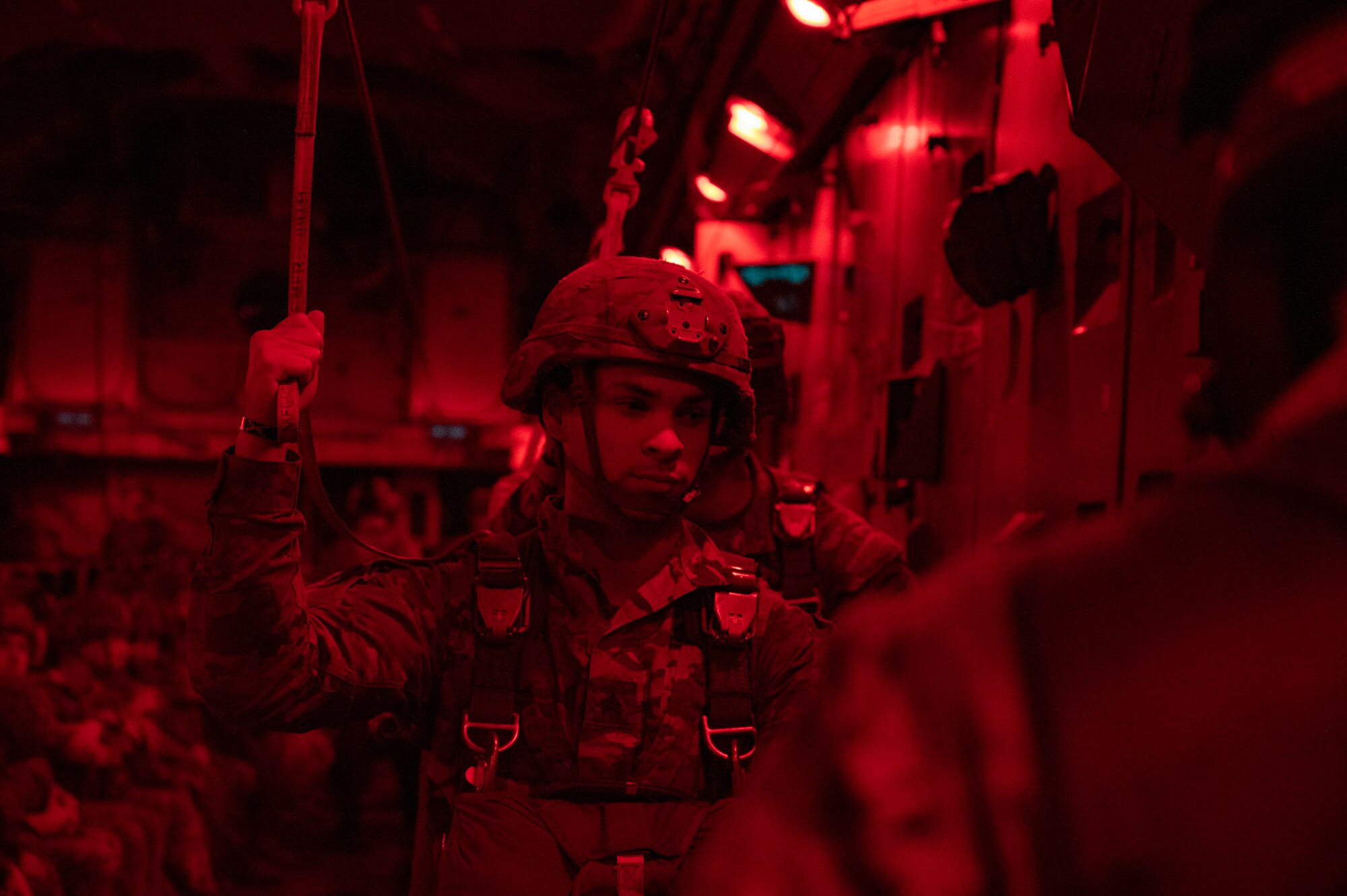 U.S. Army Soldiers assigned to the 82nd Airborne Division, Fort Bragg, North Carolina, prepare to exit a C-17 Globemaster III during Battalion Mass Tactical Week at Pope Army Airfield, North Carolina, Feb. 3, 2022. BMTW is a joint exercise between the U.S. Air Force and      U.S. Army, which gives participants the ability to practice contingency operations in a controlled environment. (U.S. Air Force photo by Airman 1st Class Charles Casner)