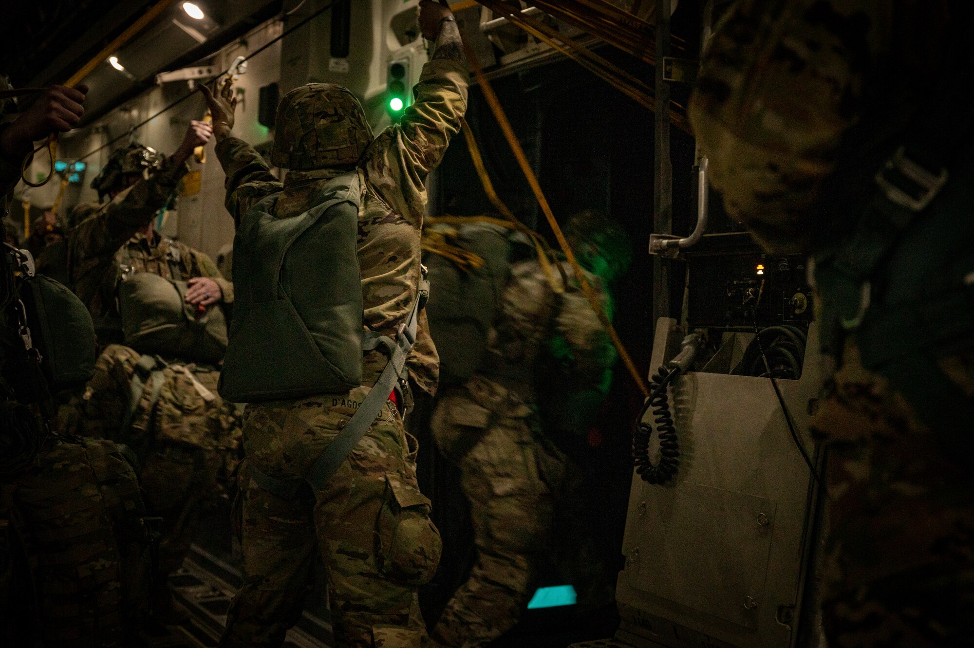 U.S. Army Soldiers assigned to the 82nd Airborne Division, Fort Bragg, North Carolina, exit a C-17 Globemaster III during Battalion Mass Tactical Week at Pope Army Airfield, North Carolina, Feb. 1, 2022. BMTW is a joint exercise between the U.S. Air Force and the U.S. Army, which gives participants the ability to practice contingency operations in a controlled environment. (U.S. Air Force photo by Airman 1st Class Charles Casner)