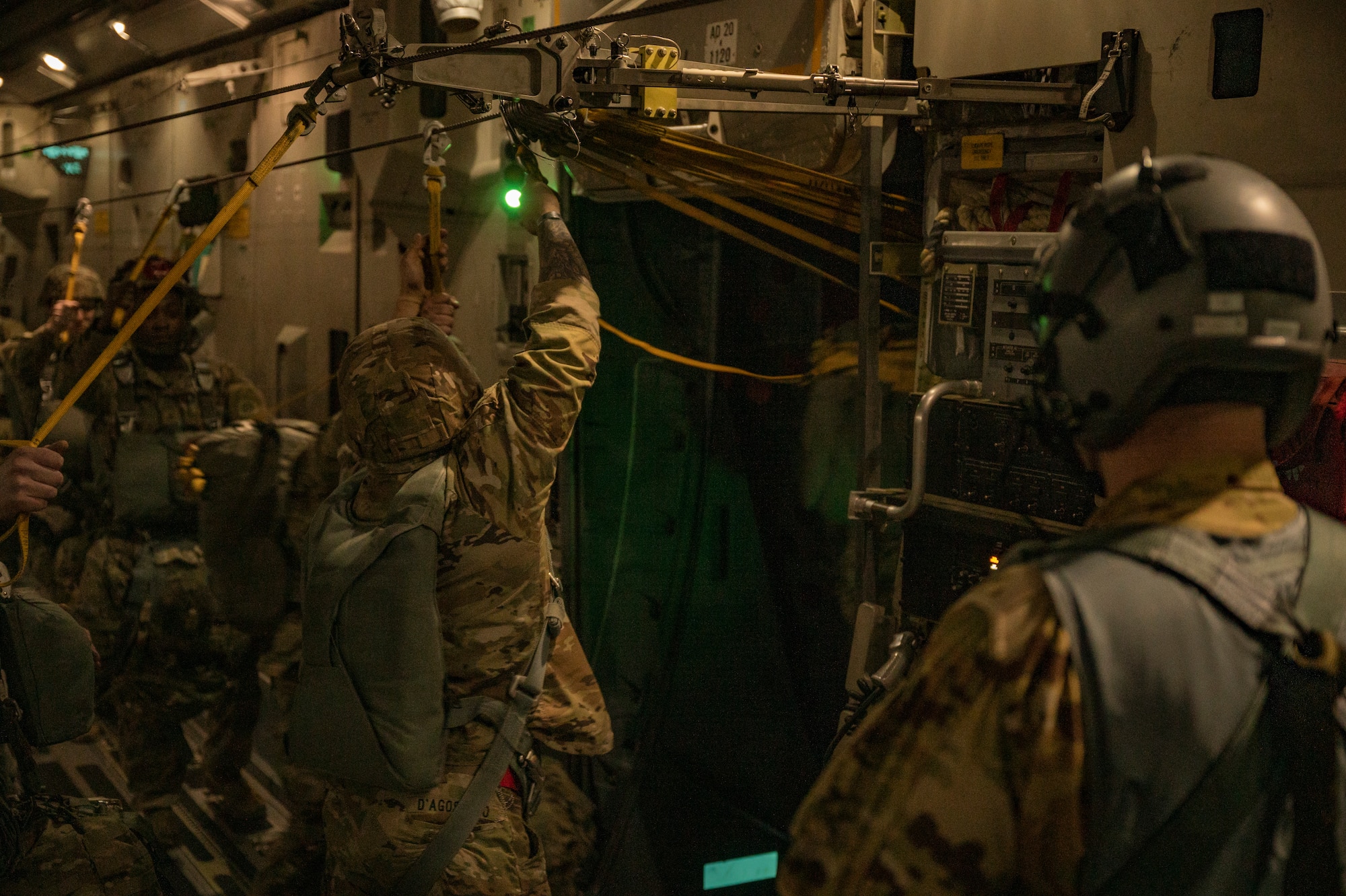U.S. Army Soldiers assigned to the 82nd Airborne Division, Fort Bragg, North Carolina, exit a C-17 Globemaster III during Battalion Mass Tactical Week at Pope Army Airfield, North Carolina, Feb. 1, 2022. BMTW is a joint exercise between the U.S. Air Force and the U.S. Army, which gives participants the ability to practice contingency operations in a controlled environment. (U.S. Air Force photo by Airman 1st Class Charles Casner)
