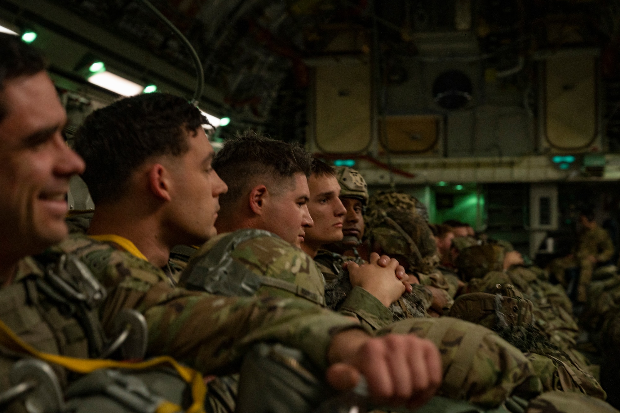 U.S. Army paratroopers assigned to the 82nd Airborne Division, Fort Bragg, North Carolina, wait for takeoff on a C-17 Globemaster III during Battalion Mass Tactical Week, or BMTW, at Pope Army Airfield, North Carolina, Jan. 31, 2022. BMTW is a joint exercise between the U.S. Air Force and the U.S. Army, which gives participants the ability to practice contingency operations in a controlled environment. (U.S. Air Force photo by Airman 1st Class Charles Casner)