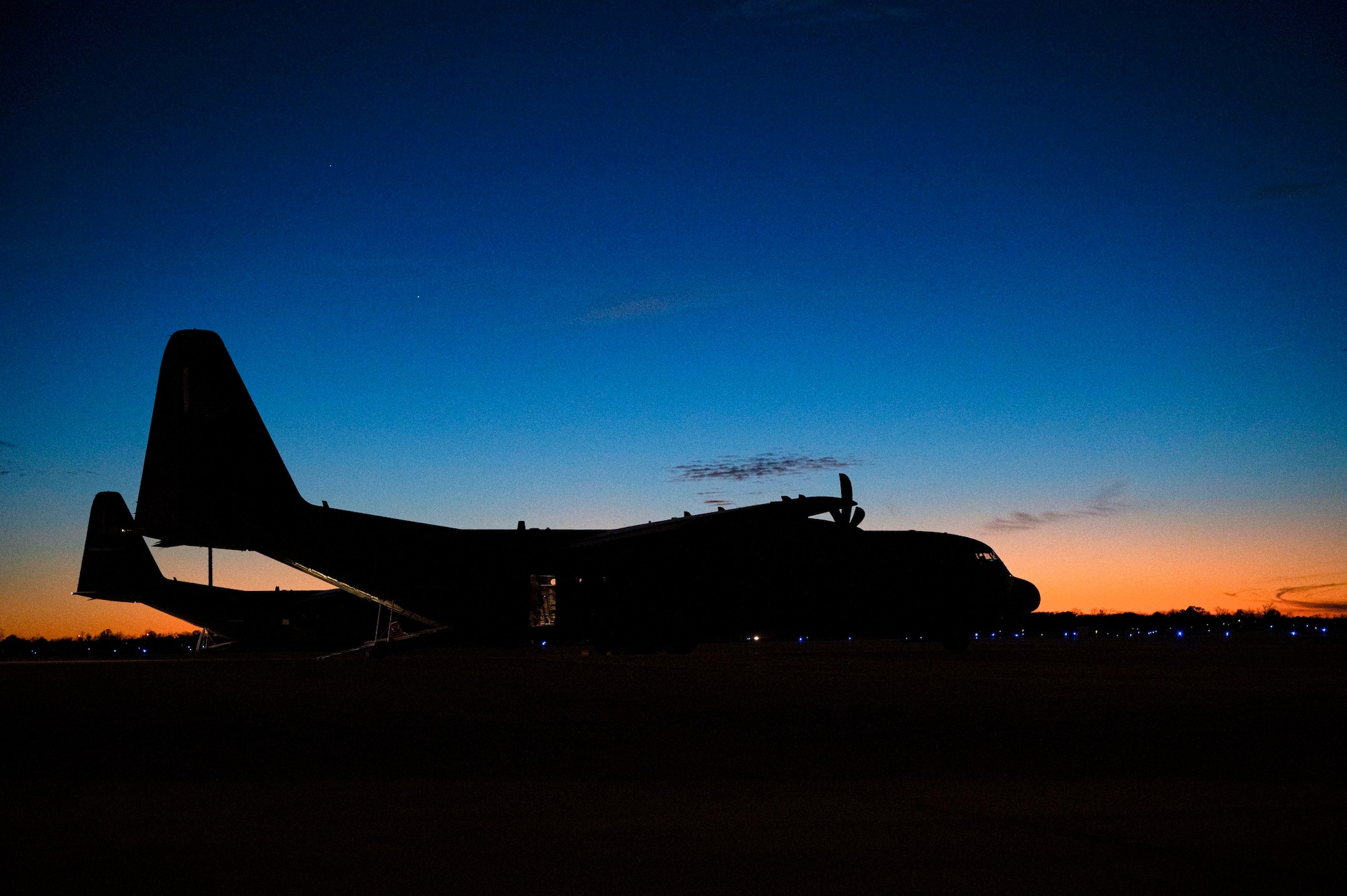 A C-130J Super Hercules assigned to the 317th Airlift Wing at Dyess Air Force Base, Texas, sits on the flight line