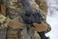 A U.S. Army paratrooper assigned to A Troop, 1st Squadron (Airborne), 40th Cavalry Regiment, 4th Infantry Brigade Combat Team (Airborne), 25th Infantry Division, U.S. Army Alaska, removes the magazine from his M4 carbine on the Light Infantry Collective Training Course at Joint Base Elmendorf-Richardson, Alaska, Feb. 2, 2022. Cavalry scouts conducted live-fire maneuver training which focused on eliminating simulated enemy positions through fire team movement. USARAK trains year-round to increase lethal combat support in an arctic environment.