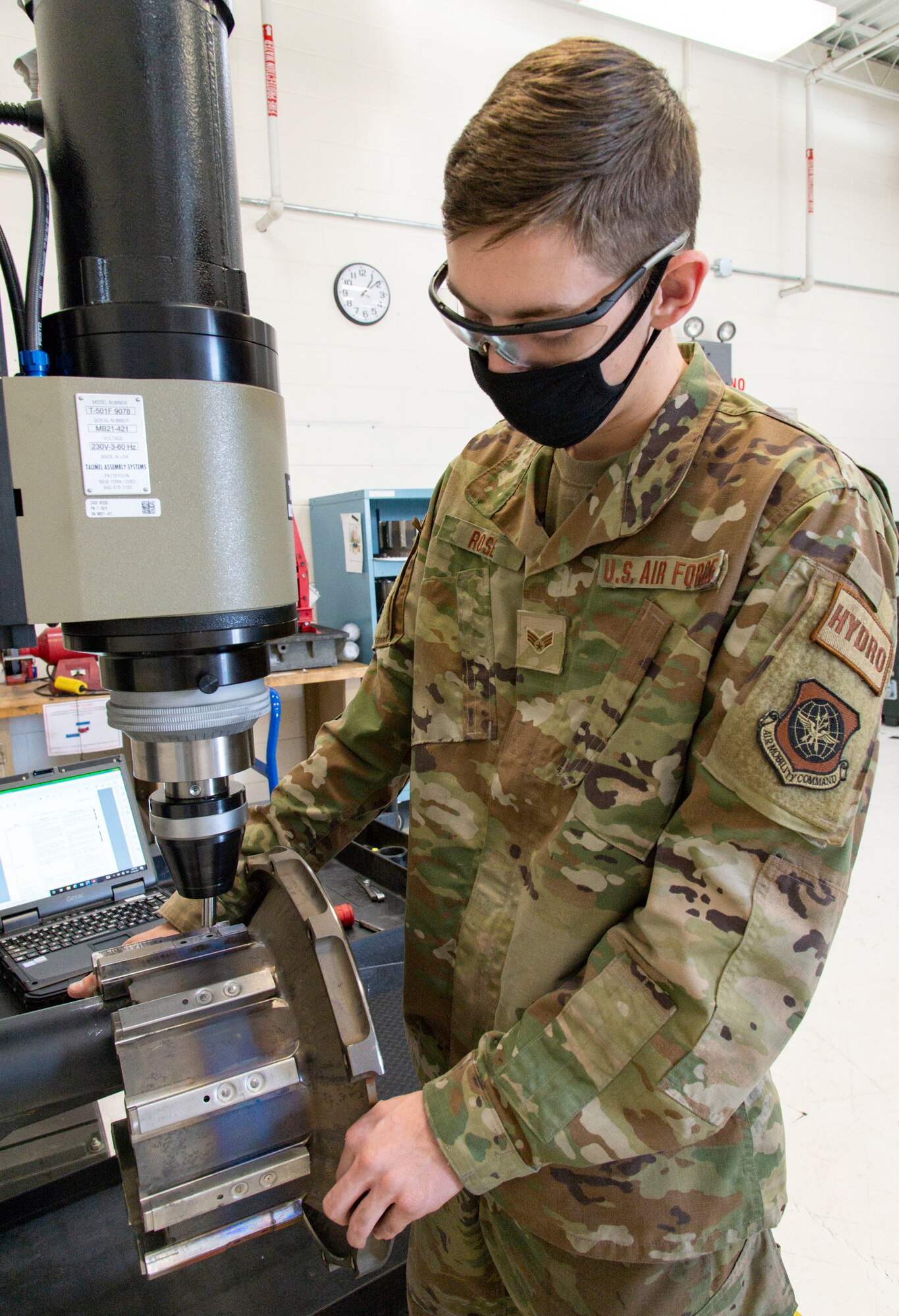 Senior Airman Weston Rose, 436th Maintenance Squadron aircraft hydraulics technician, uses an orbital riveter to secure a cap to C-5M Super Galaxy brake torque tube assembly at Dover Air Force Base, Delaware, Nov. 10, 2021. The orbital riveter assists hydraulic shop personnel in repairing C-5M brake assemblies locally and return them into the supply inventory in minimal time, eliminating the need to outsource repairs. Currently, Dover AFB is the only base that repairs brake torque tube assemblies for the Super Galaxy fleet. (U.S. Air Force photo by Roland Balik)