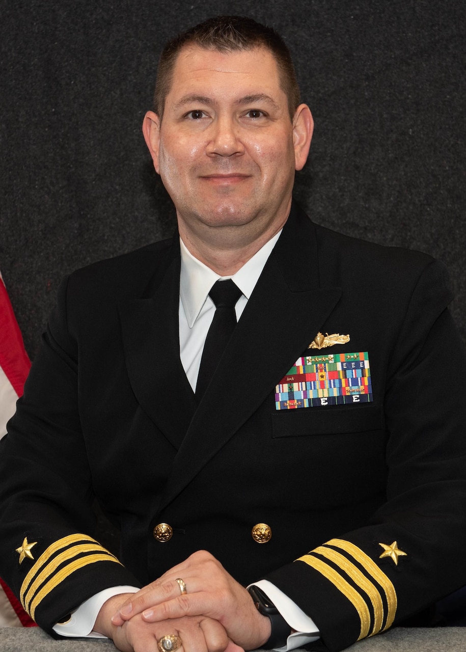 Commander Cameron D. Dennis