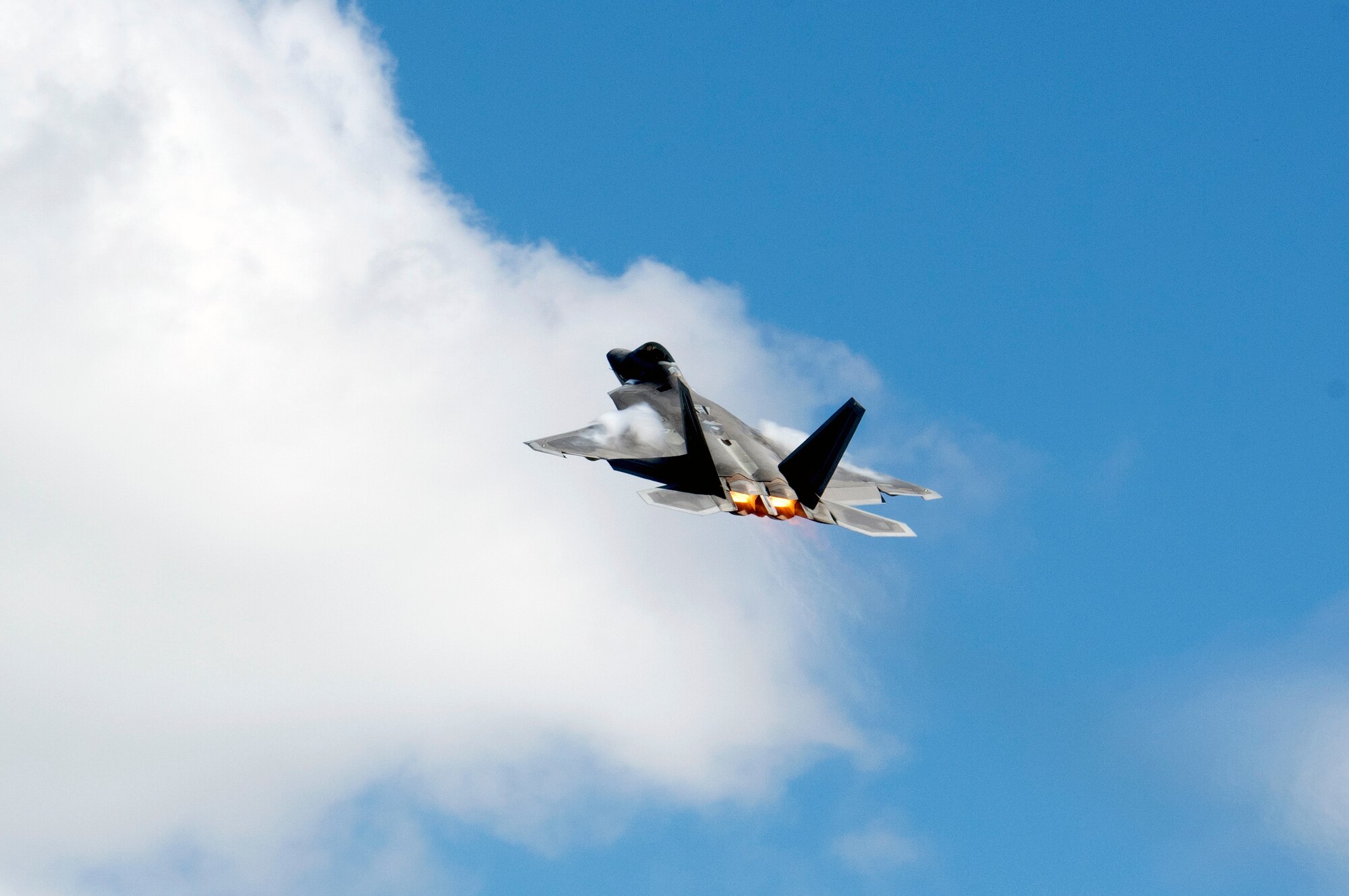 A Hawaii Air National Guard F-22 Raptor takes off during a training exercise