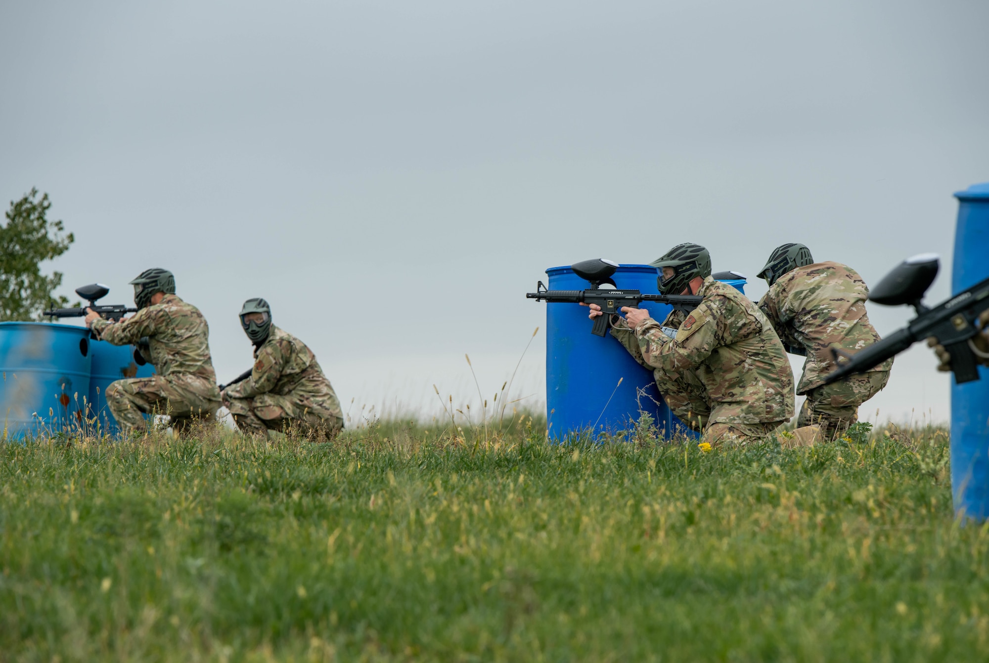 Airmen assigned to the 114th Civil Engineer Squadron practice shoot, move, communicate drills during October's Unit Training Assembly as part of the Multi-Capable Airman (MCA) concept.