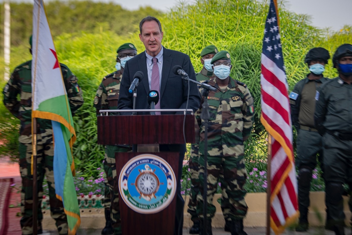 The Honorable Mr. Jonathan Pratt, U.S. Ambassador to Djibouti, provides remarks during the opening ceremony for exercise Cutlass Express 2022 at Doraleh Coast Guard Training Center, Djibouti, Feb. 6, 2022. Cutlass Express, sponsored by U.S. Africa Command and conducted by U.S. Naval Forces Africa, is designed to improve regional cooperation among participating nations in order to increase maritime safety and security in the East African coastal regions.