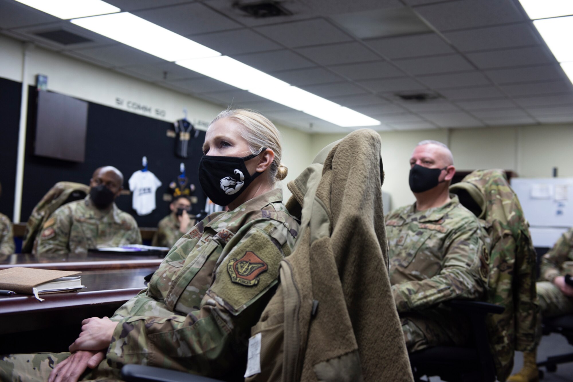 Airmen from the 51st Fighter Wing attend a virtual all-call with Air Force Chief of Staff Gen. Charles Q. Brown Jr.  and Chief Master Sgt. of the Air Force JoAnne S. Bass February 4 on Osan Air Base, Republic of Korea. Brown and Bass have been unable to visit the peninsula in person due to COVID mitigations. . (U.S. Air Force photo by Staff Sgt. Douglas Lorance)