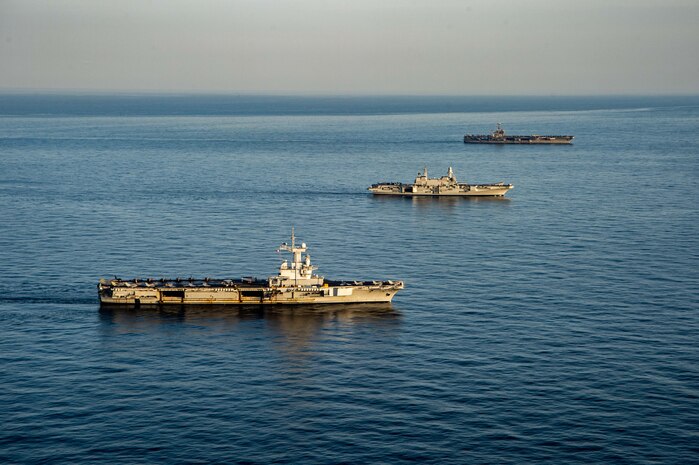 From right to left, Nimitz-class aircraft carrier USS Harry S. Truman (CVN 75), the Italian aircraft carrier ITS Cavour (C 550) and the French aircraft carrier Charles de Gaulle (R 91) transit the Mediterranean Sea in formation, Feb. 6, 2022. The Harry S. Truman Carrier Strike Group is on a scheduled deployment in the U.S. Sixth Fleet area of operations in support of naval operations to maintain maritime stability and security, and defend U.S., allied and partner interests in Europe and Africa.