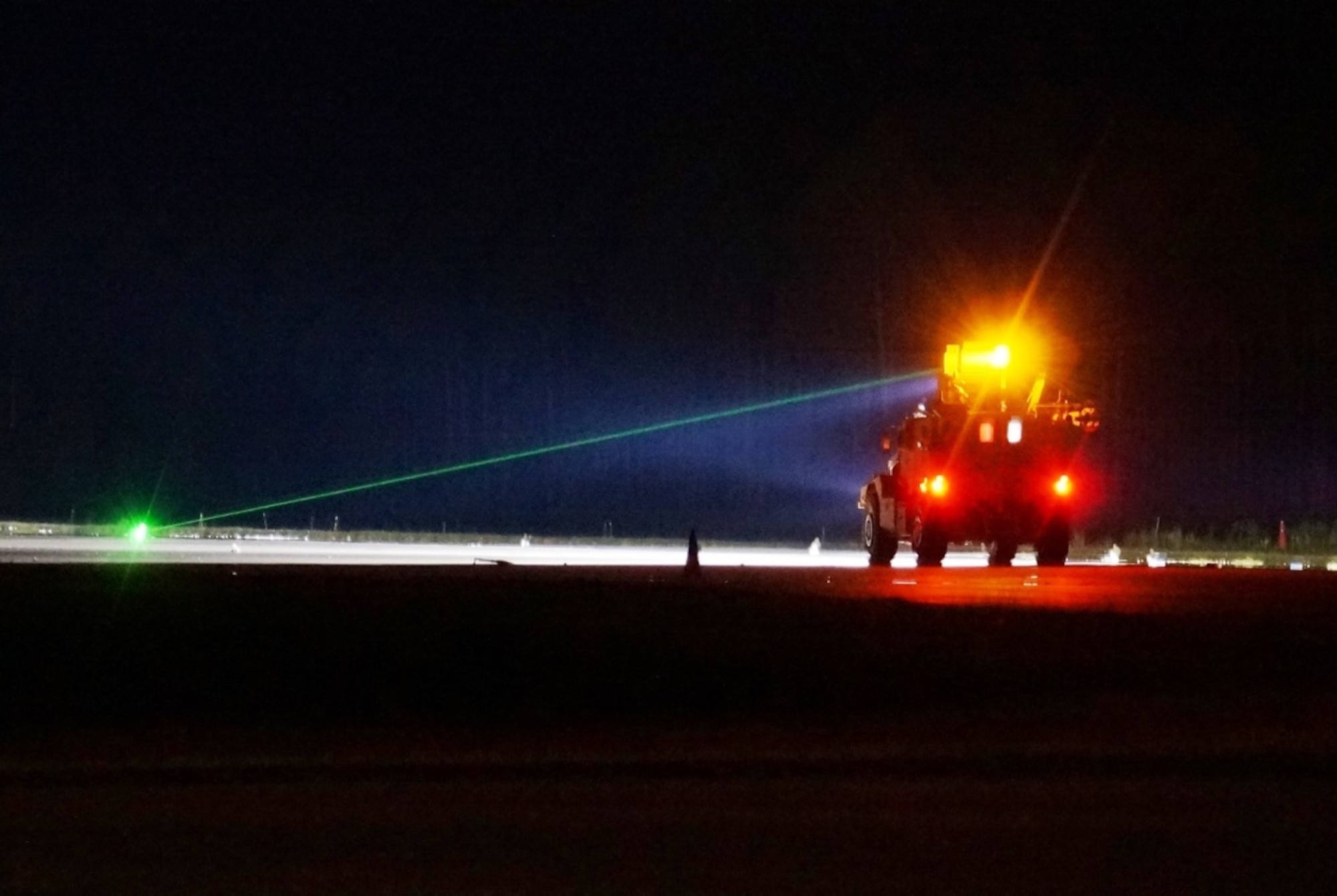 A Recovery of Airbase Denied By Ordnance (RADBO) vehicle,  uses a laser to safely detonate and clear unexploded ordnance. The Air Force Life Cycle Management Center’s Agile Combat Support Directorate will field 13 RADBOs by April of 2023.