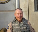 Air Force Col. (Dr.) Dean Winslow stops for a photograph during his deployment in Baghdad in 2008.