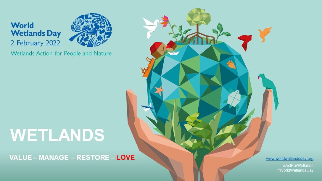 This is a graphic for World Wetlands Day 2022. It shows a pair of hands holding a world with wetlands on them.