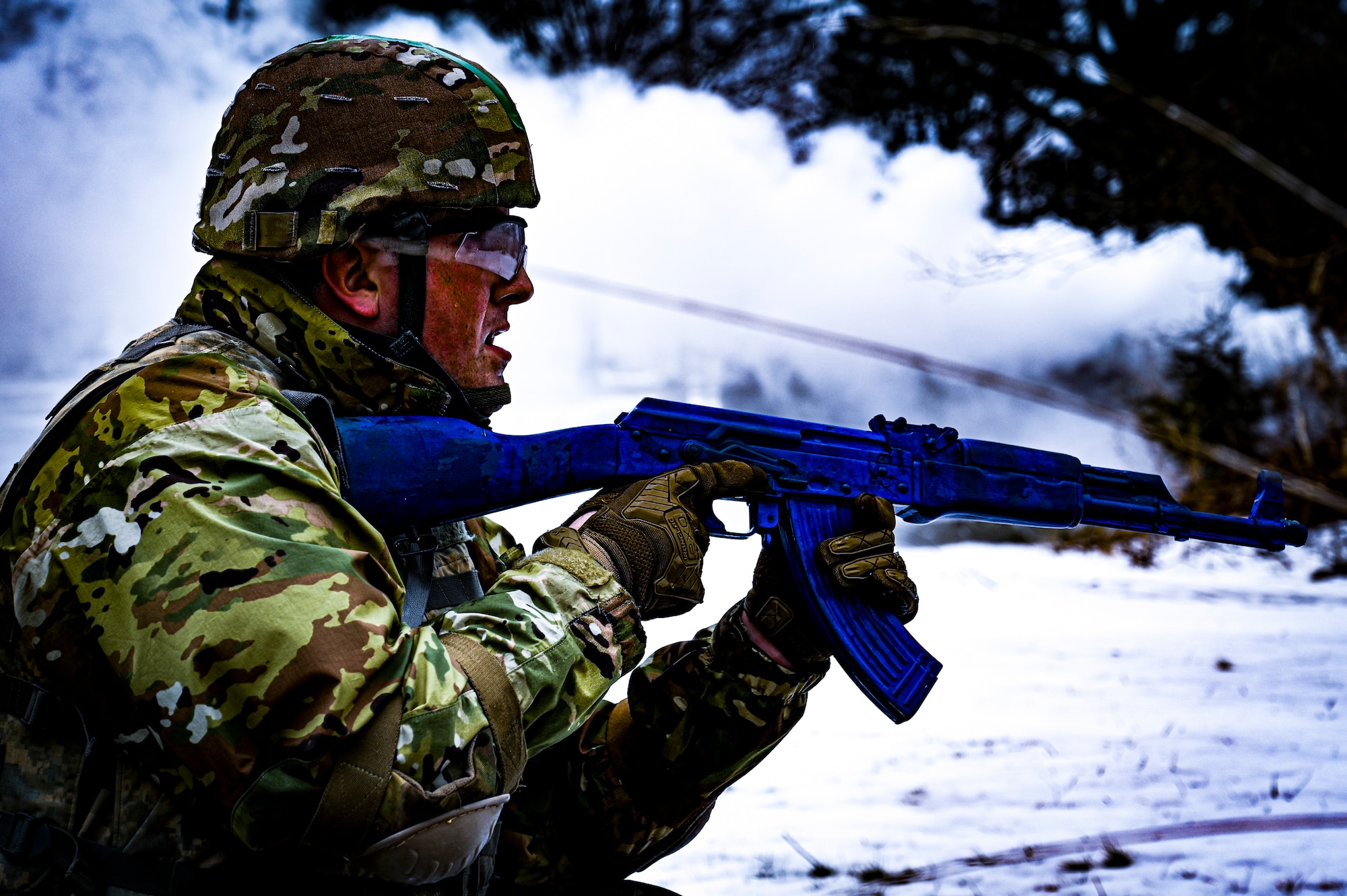 A U.S. Army Soldier, Army Support Activity Dix, provides perimeter security with a non-functional training weapon at the Medical Simulation Training Center (MSTC) on Feb. 3, 2022, at Joint Base McGuire-Dix-Lakehurst, N.J. The MSTC provides state of the art training in treating all areas of trauma and basic medical scenarios. Under the principles of Tactical Casualty Combat Care (TC3), students gain knowledge and skills to treat severe bleeding, manage a tension pneumothorax, and establish a secure airway. The MSTC offers TC3 training through classroom instruction, basic hands-on training, and the use of realistic trauma and medical scenarios. The functional skills developed are supported and reinforced by a final simulated battlefield exercise. This immersive environment helps to familiarize the student with potential environments found in deployed environments.