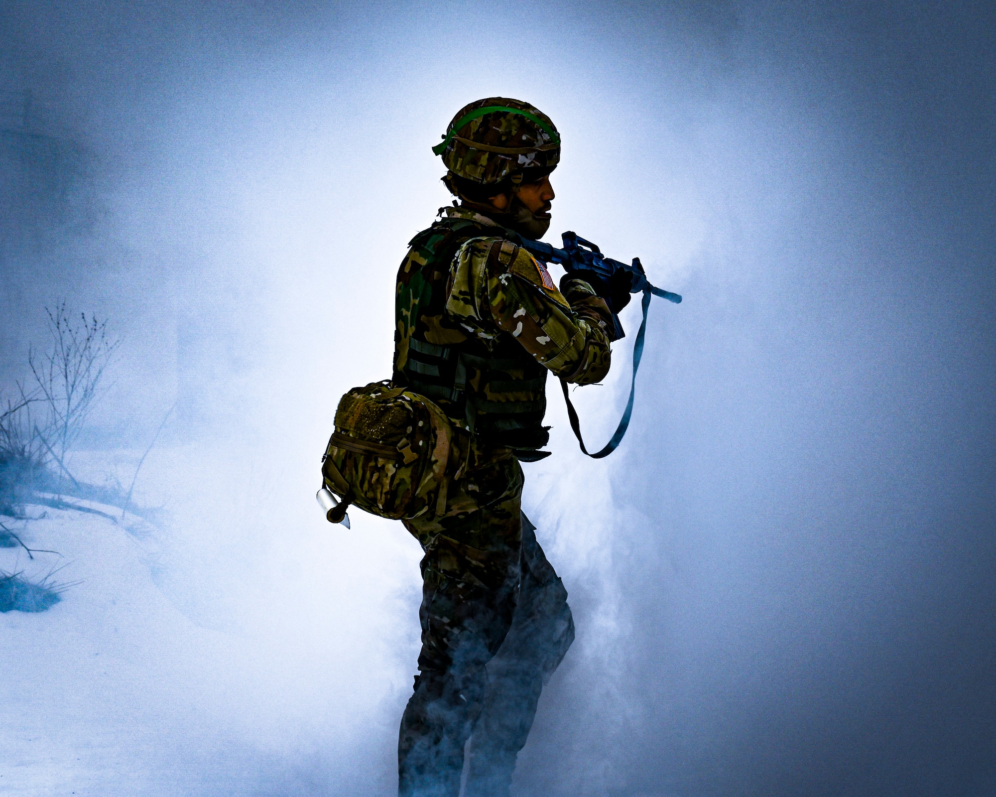 A U.S. Army Soldier, Army Support Activity Dix, provides perimeter security with a non-functional training weapon at the Medical Simulation Training Center (MSTC) on Feb. 3, 2022, at Joint Base McGuire-Dix-Lakehurst, N.J. The MSTC provides state of the art training in treating all areas of trauma and basic medical scenarios. Under the principles of Tactical Casualty Combat Care (TC3), students gain knowledge and skills to treat severe bleeding, manage a tension pneumothorax, and establish a secure airway. The MSTC offers TC3 training through classroom instruction, basic hands-on training, and the use of realistic trauma and medical scenarios. The functional skills developed are supported and reinforced by a final simulated battlefield exercise. This immersive environment helps to familiarize the student with potential environments found in deployed environments.