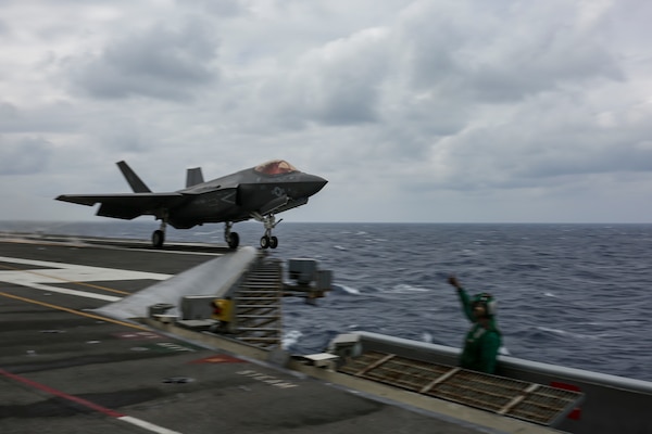 An F-35C Lightning II, assigned to the "Black Knights" of Marine Fighter Attack Squadron (VMFA) 314, launches from the flight deck of the Nimitz-class aircraft carrier USS Abraham Lincoln (CVN 72).