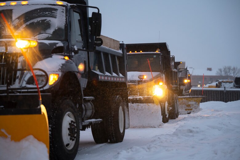 Snow plows line up