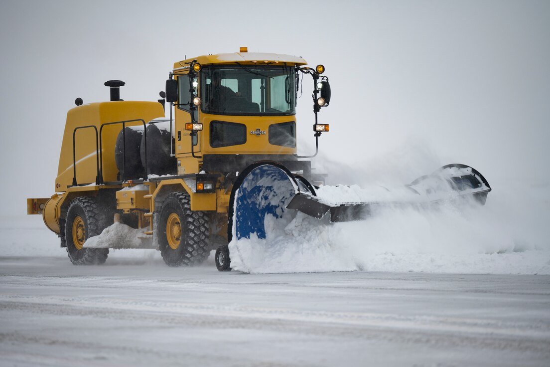Snow plows line up