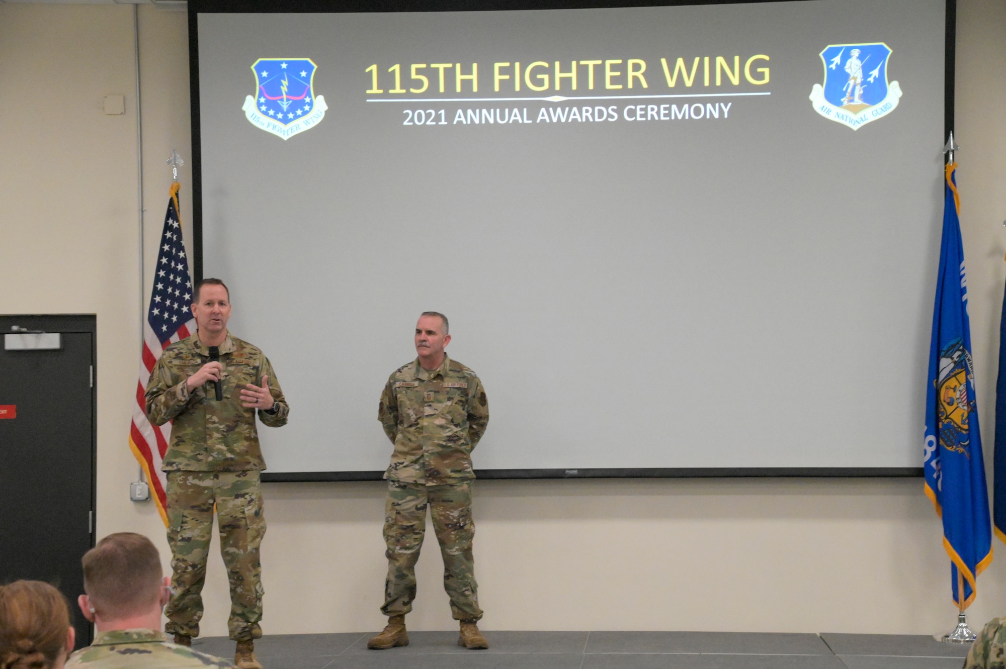 U.S. Air Force Col. Bart Van Roo, 115th Fighter Wing commander, and Chief Master Sgt. Brian Carroll, 115th FW command chief, provide opening statements during the annual awards ceremony at Truax Field, Madison, Wisconsin Feb. 5, 2022. The 115th Fighter Wing holds an annual awards ceremony to recognize the achievements of unit members.