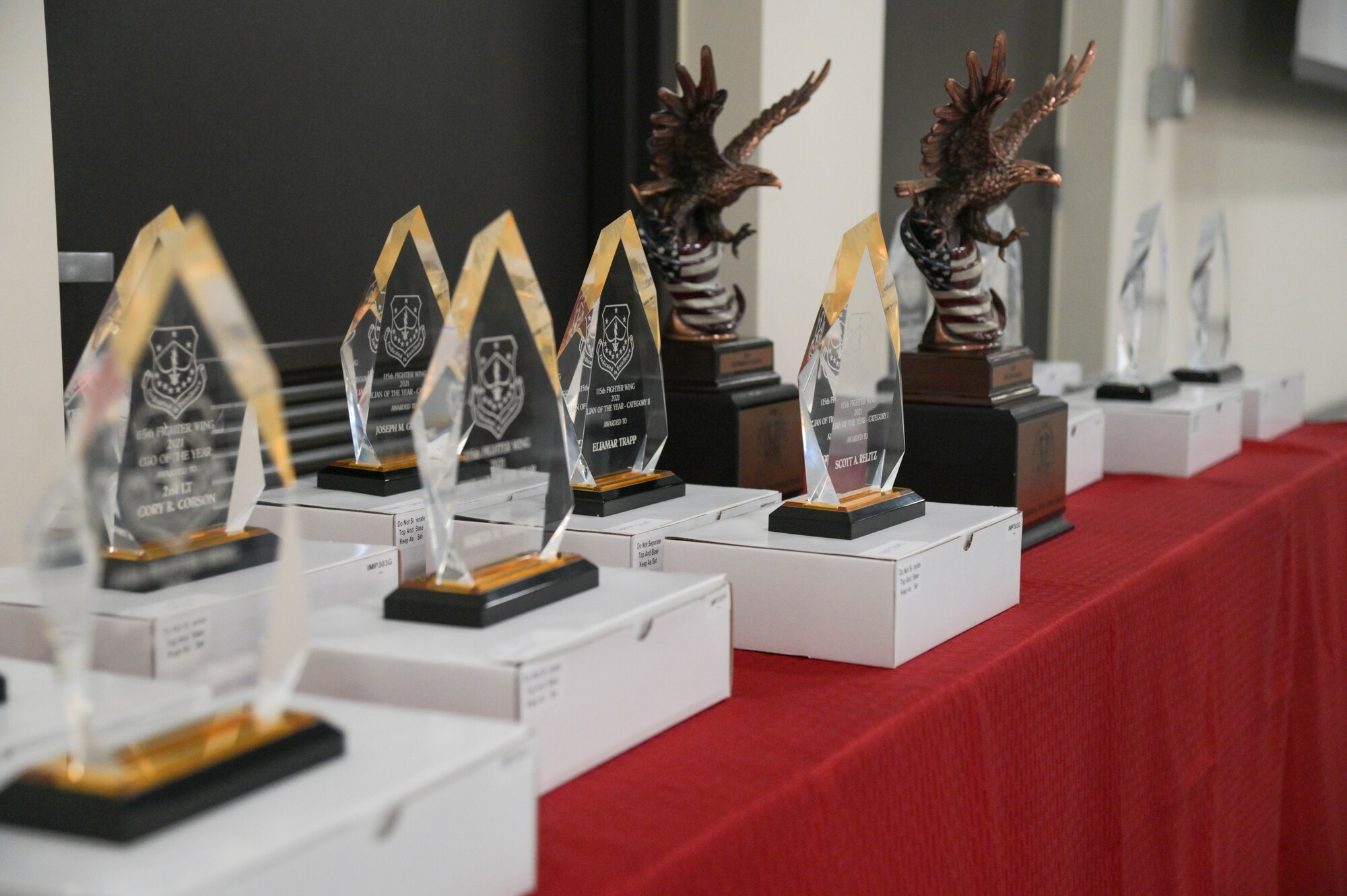 Awards are lined up to be presented to deserving members of the Wisconsin Air National Guard's 115th Fighter Wing during the annual awards ceremony at Truax Field, Madison, Wisconsin Feb. 5, 2022. The 115th Fighter Wing holds an annual awards ceremony to recognize the achievements of unit members.