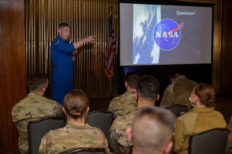 U.S. Space Force Col. Mike Hopkins, NASA astronaut, answers questions from Airmen and Guardians following a presentation at the Hub on Peterson Space Force Base, Colorado, Jan. 25, 2022. Hopkins, the first astronaut to transfer into the Space Force, discussed his career as an Airman, Guardian and astronaut, sharing stories from his 334 days in space. (U.S. Space Force photo by Paul Honnick)