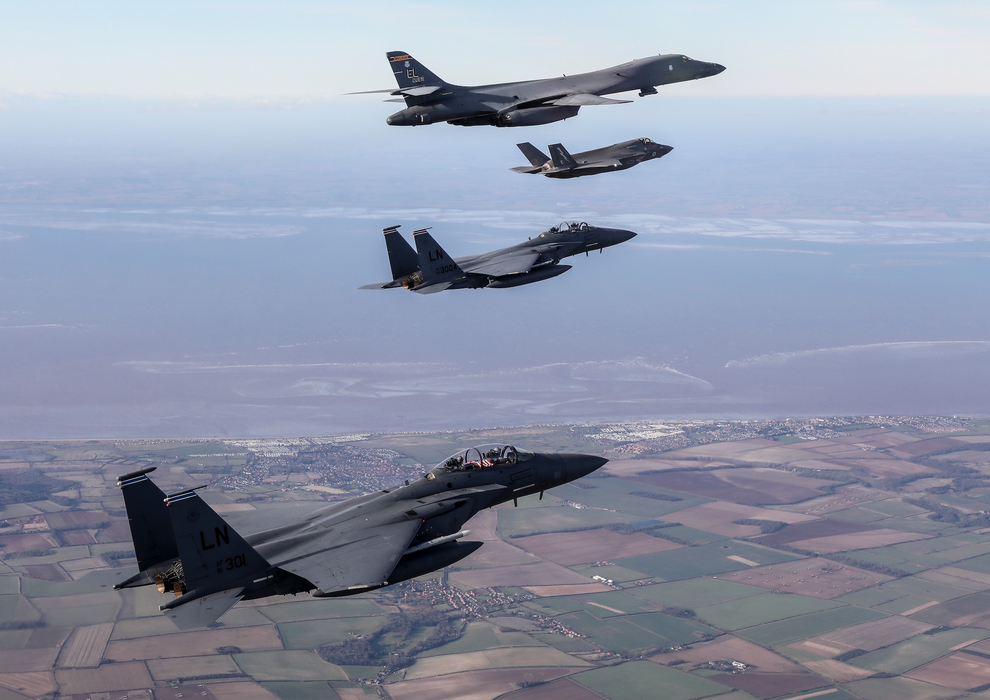 On 01 February 2022, F35B aircraft from Royal Air Force Marham joined US Air Force B1B and F15 aircraft for multiple fly-pasts over the United Kingdom to commemorate the 80th anniversary of the Eighth Air Force.

The Royal Air Force’s fifth-generation fighter jets joined the X strategic bombers, which had flown directly from the US, and X for the fly-pasts of both RAF Lakenheath and RAF Duxford. The location was pertinent as it was once home to an Eighth Air Force P-51 unit and now hosts the largest air museum in Europe.

Originally stood up on 1st February 1942 at Langley Field, Virginia, VIII Bomber Command moved to England a short while later, first to RAF Daws Hill and later to RAF High Wycombe, the RAF’s Bomber Command, where it established its wartime headquarters in the Wycombe Abbey School. The Eighth Air Force was a US Army Air Force Combat Air Force, focused on the European Theatre, that carried out strategic bombing of targets in France, the Low Countries and Germany.

Eighth Air Force and Joint-Global Strike Operations Center commander, Major General. Andrew Gebara said “The Eighth Air Force has a long, rich history that dates back to World War II. Not only does this flight signify the longevity and reach of the United States’ bomber force, but it pays tribute to our UK allies as well. Eighth Air Force has had a close relationship with the Royal Air Force since its beginning.”

On 22nd February 1944, the US reorganised its Air Forces in Europe by renaming Eighth Air Force as the United States Strategic Air Forces in Europe, which is today known as United States Air Forces in Europe.