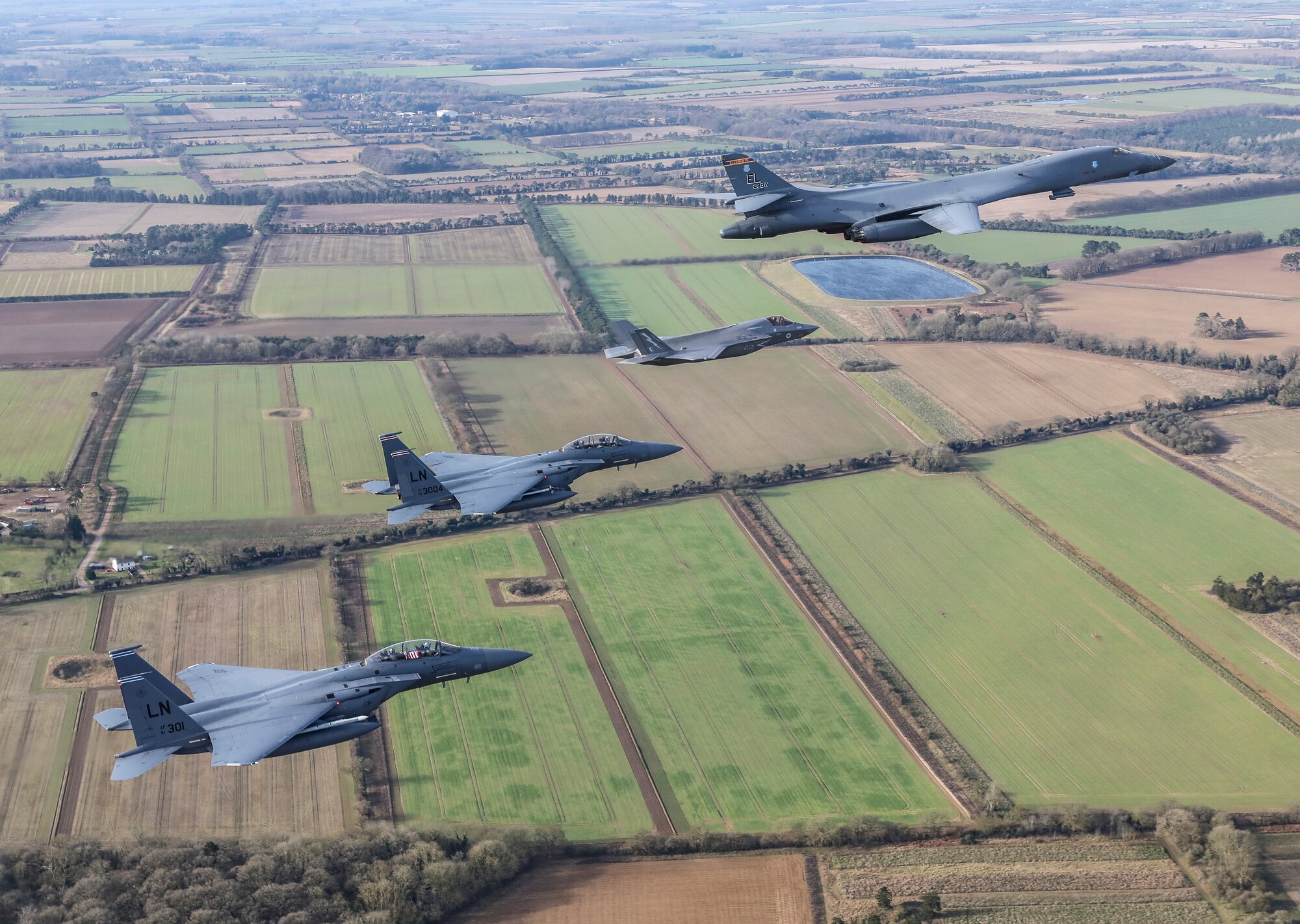 On 01 February 2022, F35B aircraft from Royal Air Force Marham joined US Air Force B1B and F15 aircraft for multiple fly-pasts over the United Kingdom to commemorate the 80th anniversary of the Eighth Air Force.

The Royal Air Force’s fifth-generation fighter jets joined the X strategic bombers, which had flown directly from the US, and X for the fly-pasts of both RAF Lakenheath and RAF Duxford. The location was pertinent as it was once home to an Eighth Air Force P-51 unit and now hosts the largest air museum in Europe.

Originally stood up on 1st February 1942 at Langley Field, Virginia, VIII Bomber Command moved to England a short while later, first to RAF Daws Hill and later to RAF High Wycombe, the RAF’s Bomber Command, where it established its wartime headquarters in the Wycombe Abbey School. The Eighth Air Force was a US Army Air Force Combat Air Force, focused on the European Theatre, that carried out strategic bombing of targets in France, the Low Countries and Germany.

Eighth Air Force and Joint-Global Strike Operations Center commander, Major General. Andrew Gebara said “The Eighth Air Force has a long, rich history that dates back to World War II. Not only does this flight signify the longevity and reach of the United States’ bomber force, but it pays tribute to our UK allies as well. Eighth Air Force has had a close relationship with the Royal Air Force since its beginning.”

On 22nd February 1944, the US reorganised its Air Forces in Europe by renaming Eighth Air Force as the United States Strategic Air Forces in Europe, which is today known as United States Air Forces in Europe.