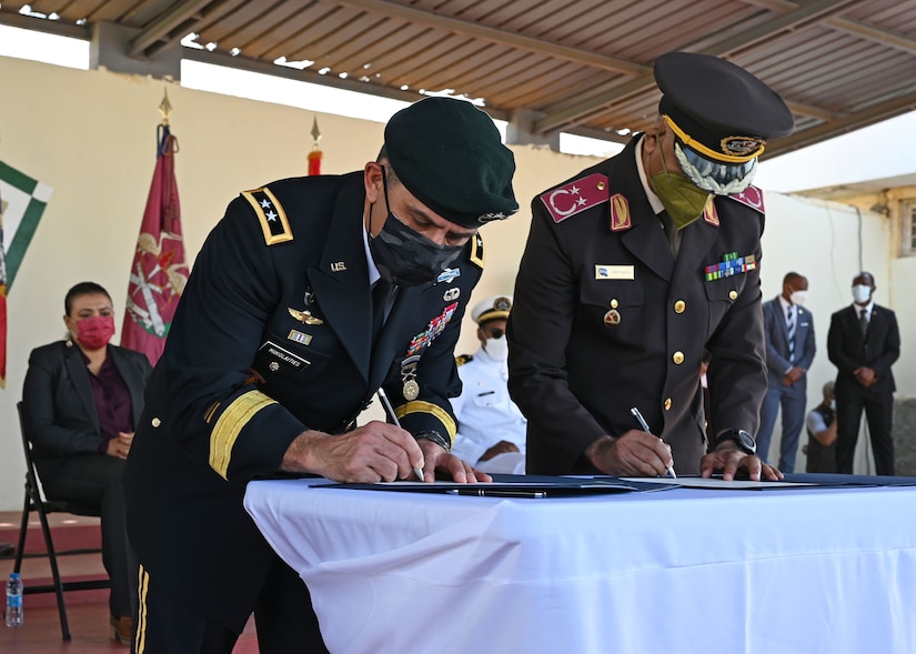Army Maj. Gen. David Mikolaities, adjutant general, New Hampshire National Guard, and the chief of staff of the Cabo Verdean Armed Forces, Maj. Gen. Anildo Morais, sign a Department of Defense National Guard State Partnership Program agreement in the Republic of Cabo Verde, Feb. 4, 2022. The Atlantic island nation off Africa's west coast became the latest SPP partner on the same day the National Guard's most senior general was representing the component at the 2022 African Chiefs of Defense Conference in Rome. There are now 17 partnerships in Africa, 16 of them with nations in the USAFRICOM area of responsibility, and one with Egypt, in U.S. Central Command’s AOR.