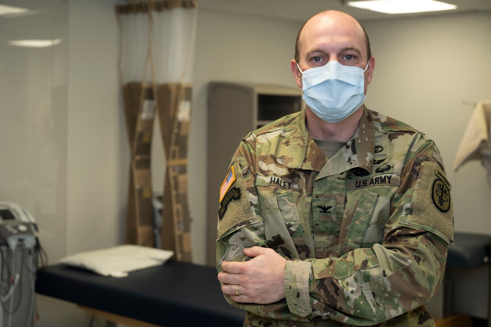 U.S. Army Col. Chad Haley, MD, Keller Army Community Hospital Chief of surgery poses for a photo in the physical therapy room at the 87th Medical Group on Joint Base McGuire-Dix-Lakehurst, N.J., Feb. 3, 2022. In coordination with KACH, a military orthopedic surgeon will be traveling to Joint Base MDL once a month to evaluate patients in need of potential surgical and postoperative care. (U.S. Air Force photo by Senior Airman Ariel Owings)