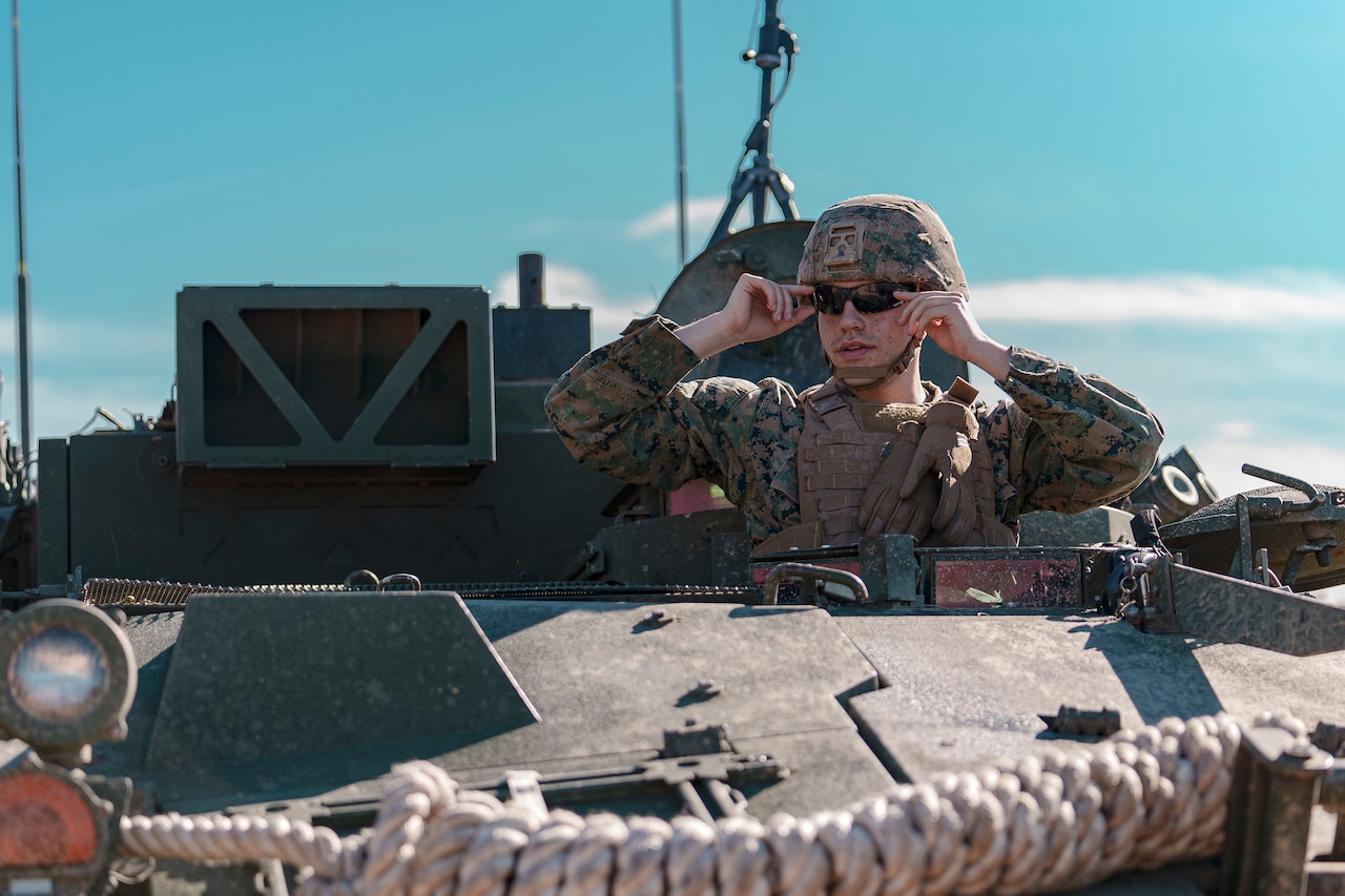 A Marine peers into the distance.