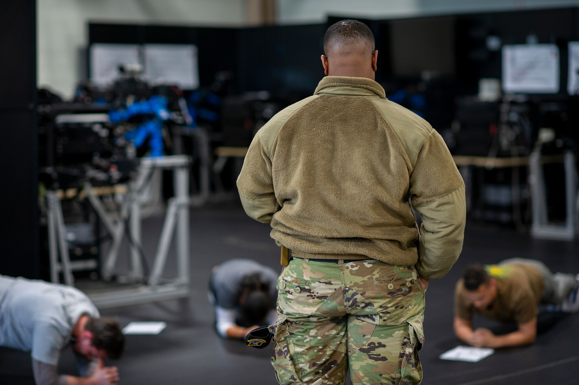 Trainees with the 514th Air Mobility Wing Development and Training Flight, Joint Base McGuire-Dix-Lakehurst, N.J., were able to familiarize themselves with the new alternate Air Force Physical Fitness Assessment components during a mock exam Feb. 5, 2022. The new components include a 20 meter high aerobic multi-shuttle run for the cardio portion, hand release push-ups for the strength portion, and either cross-leg reverse crunches or a plank for the sit-up portion.