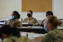 U.S. Army Reserve Brig. Gen. Andree Carter, center, Task Force commanding general, listens to ways to build rapport during Task Force Female Engagement Team Training at Fort McCoy, Wisconsin, Dec. 17, 2021. Female Engagement Teams scheduled to engage from Dec. 22, 2021 to Jan. 12, 2022. The Department of Defense, through U.S. Northern Command, and in support of the Department of Homeland Security, is providing transportation, temporary housing, medical screening, and general support for at least 50,000 Afghan evacuees at suitable facilities, in permanent or temporary structures, as quickly as possible. This initiative provides Afghan personnel essential support at secure locations outside Afghanistan. (U.S. Army photo by Yesenia Barajas, 7th Mobile Public Affairs Detachment)