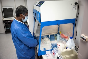 Radford Mitchell, McDonald Army Health Center medical laboratory technician, prepares samples for COVID testing at Joint Base Langley-Eustis, Virginia, Feb. 7, 2022. During the end of year holidays, the lab personnel processed over 100 tests on a consistent basis. (U.S. Air Force photo by Senior Airman Anthony Nin Leclerec)