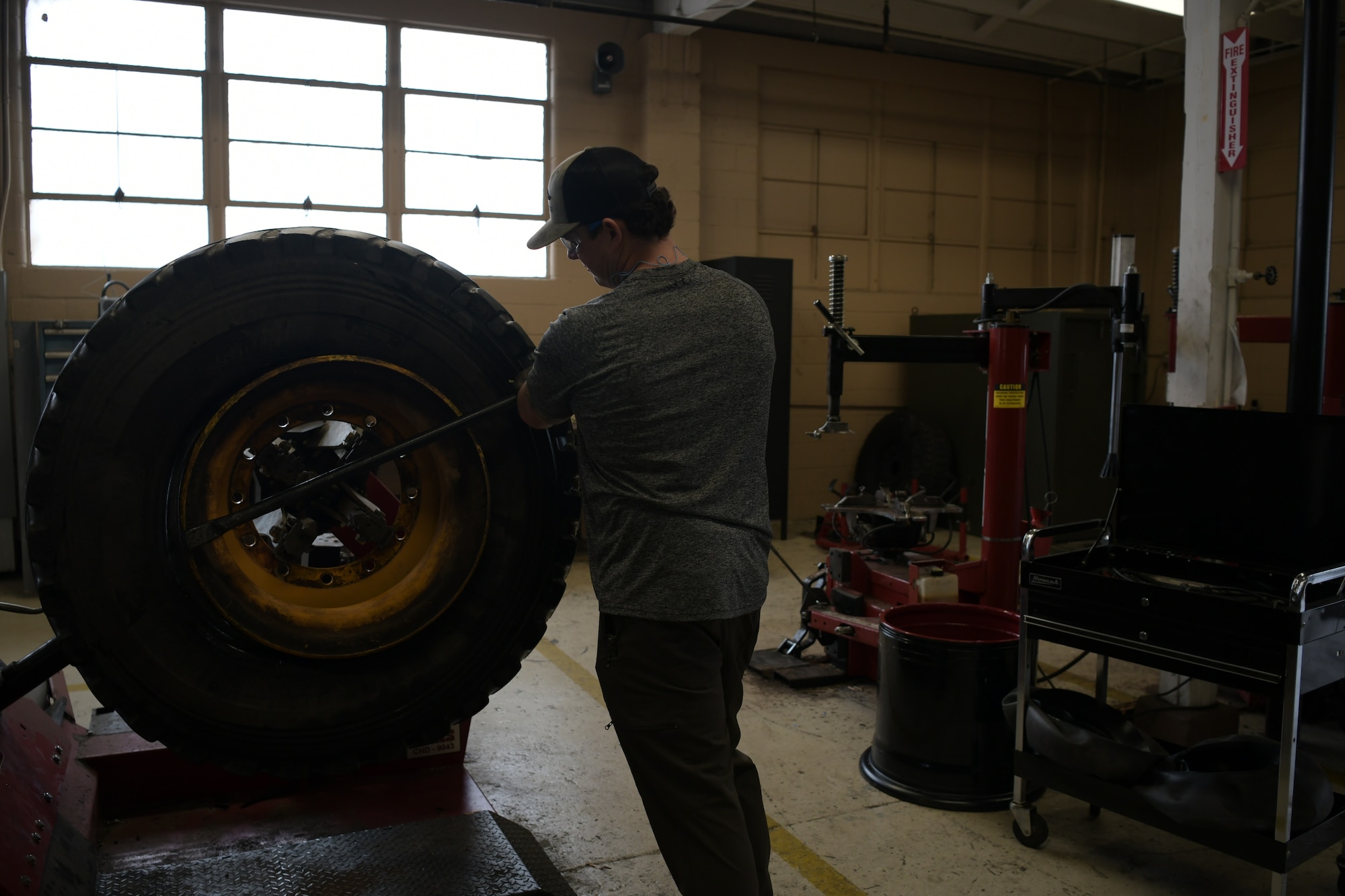 Man working on tire