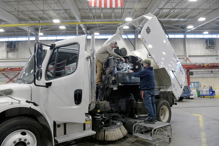 Man working on truck