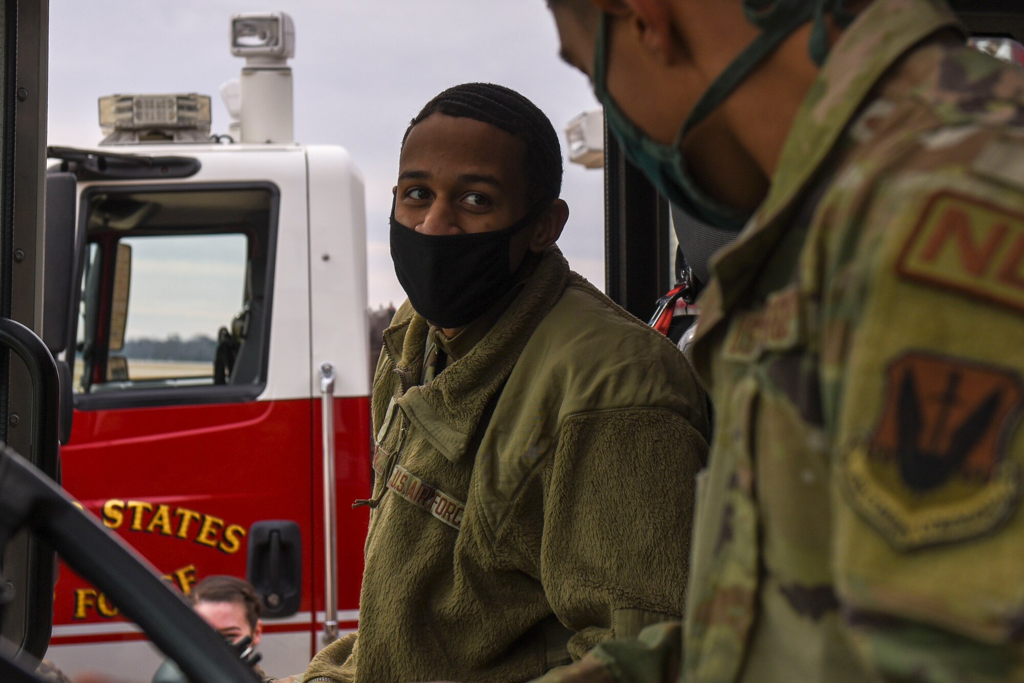 Airman participate in a firehouse tour