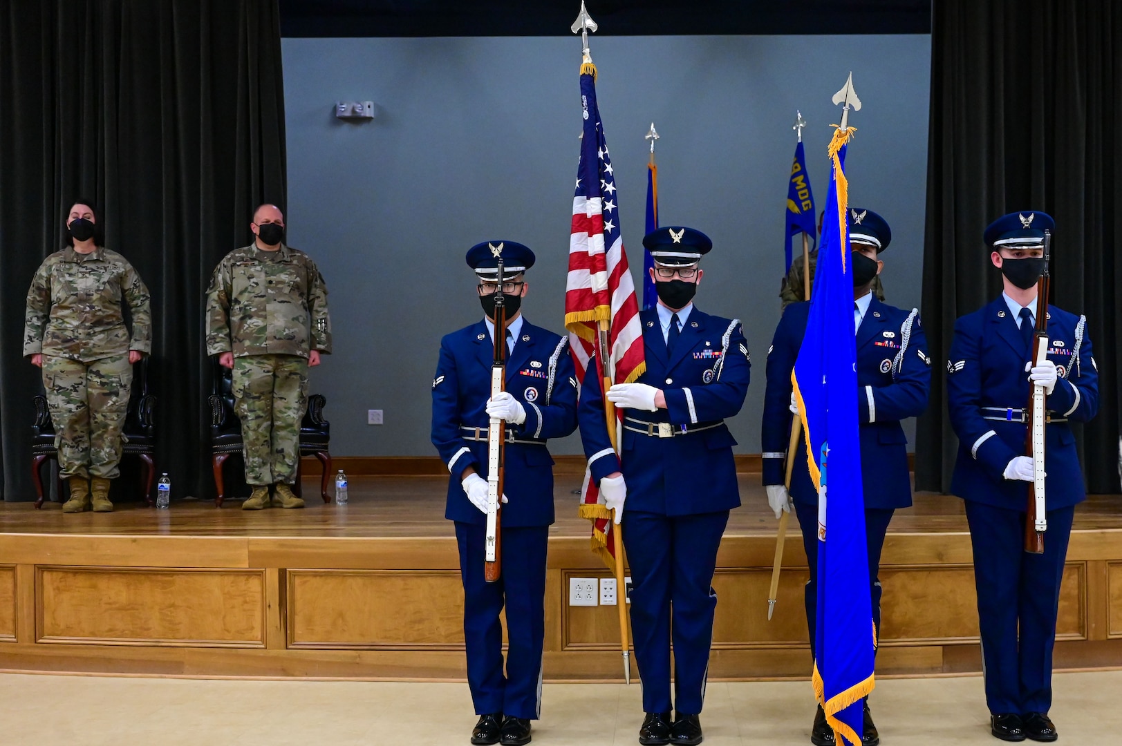 Members of the Little Rock Air Force Base Honor Guard present the colors