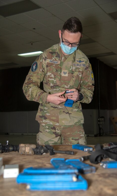 U.S. Space Force Tech. Sgt. Jeffrey “Singe” Matheny, Space Delta 3 - Space Electromagnetic Warfare, 4th Space Control Squadron noncommissioned officer in charge of weapons and tactics, participates in combatives and small arm tactics training on Peterson Space Force Base Jan. 12, 2022.