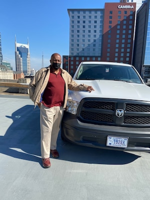 Ronnie Davis, Nashville District Employee of the Month, returns a vehicle to the fleet.