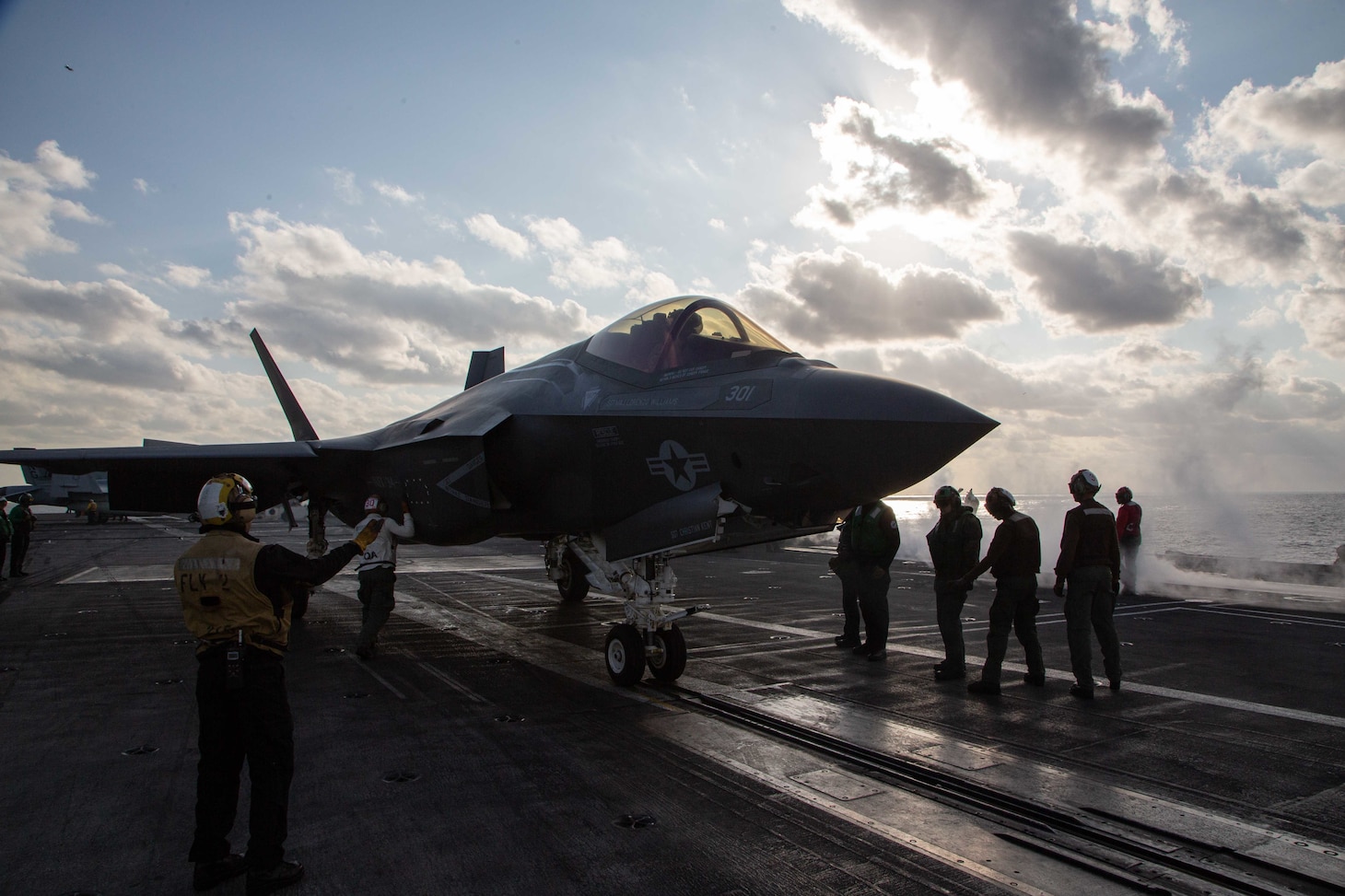 PHILIPPINE SEA (Feb. 6, 2022) Marines of Marine Wing Fighter Attack Squadron (VMFA) 314 launch from the flight deck of the aircraft carrier USS Abraham Lincoln (CVN 72) as they provided simulated defense carrier air support for long-range maritime strikes throughout the day and night during amphibious operations in support of Noble Fusion. Noble Fusion highlights that Navy and Marine Corps forward-deployed stand-in naval expeditionary forces can rapidly aggregate Marine Expeditionary Unit/Amphibious Ready Group teams at sea, along with a carrier strike group, as well as other joint force elements and allies, in order to conduct lethal sea-denial training, seize key maritime terrain, guarantee freedom of movement, and create advantage for US, partner and allied forces. Naval Expeditionary forces conduct training throughout the year, in the Indo-Pacific, to maintain readiness. (U.S. Marine Corps photo by Capt. Charles Allen)