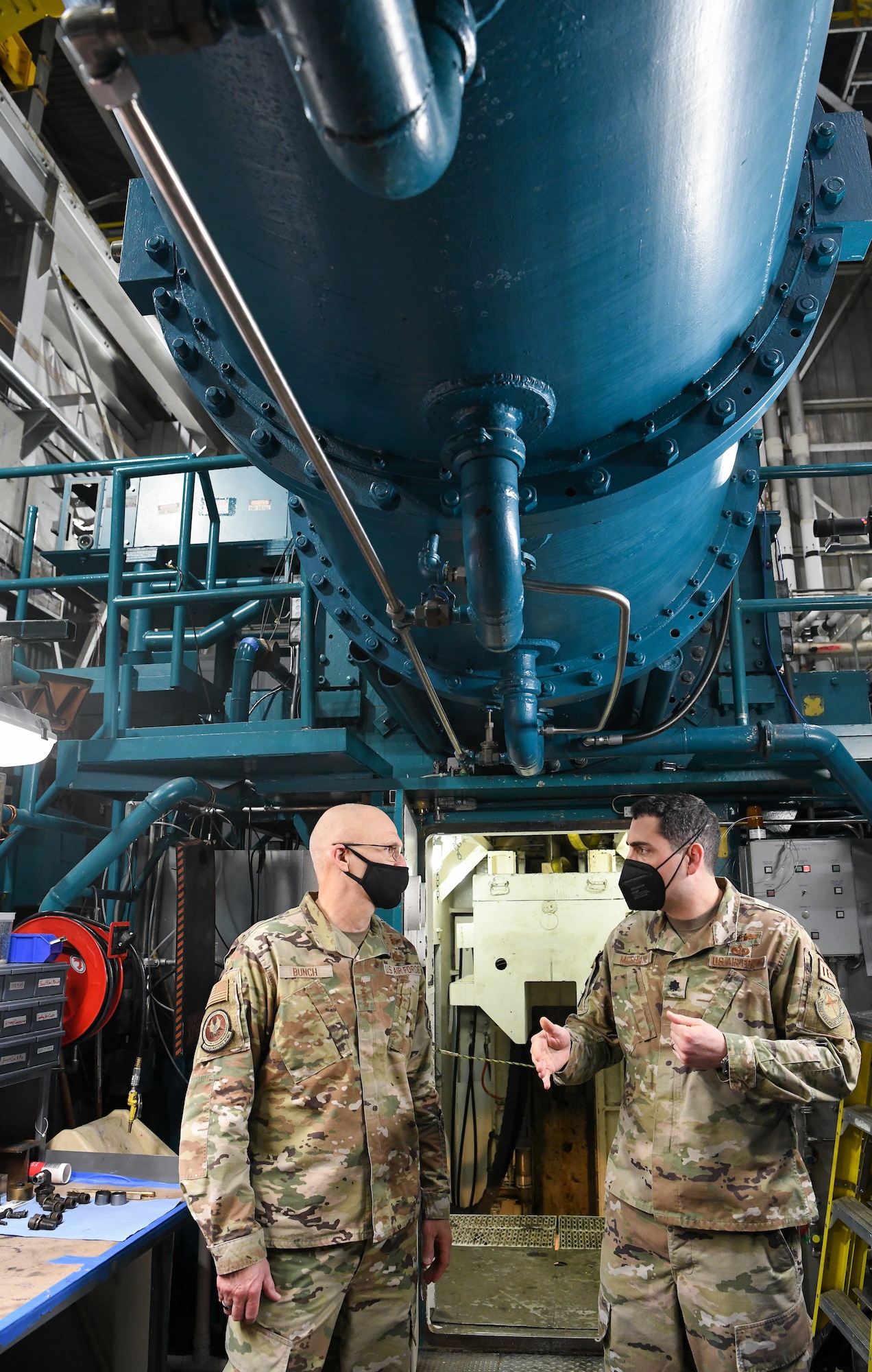 Lt. Col. John McShane, chief, Aerodynamics Test Branch, Test Division, Arnold Engineering Development Complex (AEDC), speaks with Gen. Arnold W. Bunch Jr., commander, Air Force Materiel Command, while showing him around Tunnel B of the von Kármán Gas Dynamics Facility at Arnold Air Force Base, Tenn., headquarters of AEDC, Jan. 27, 2022. (U.S. Air Force photo by Jill Pickett)
