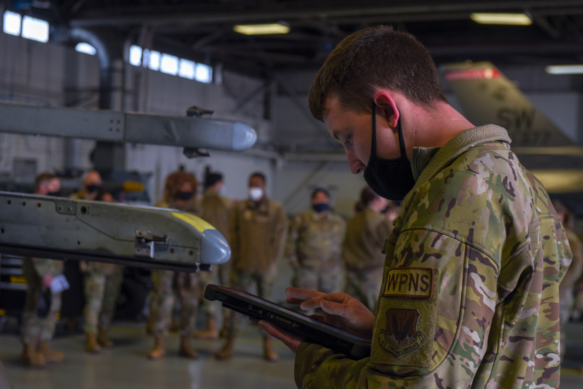 Airman supervises a demonstration.