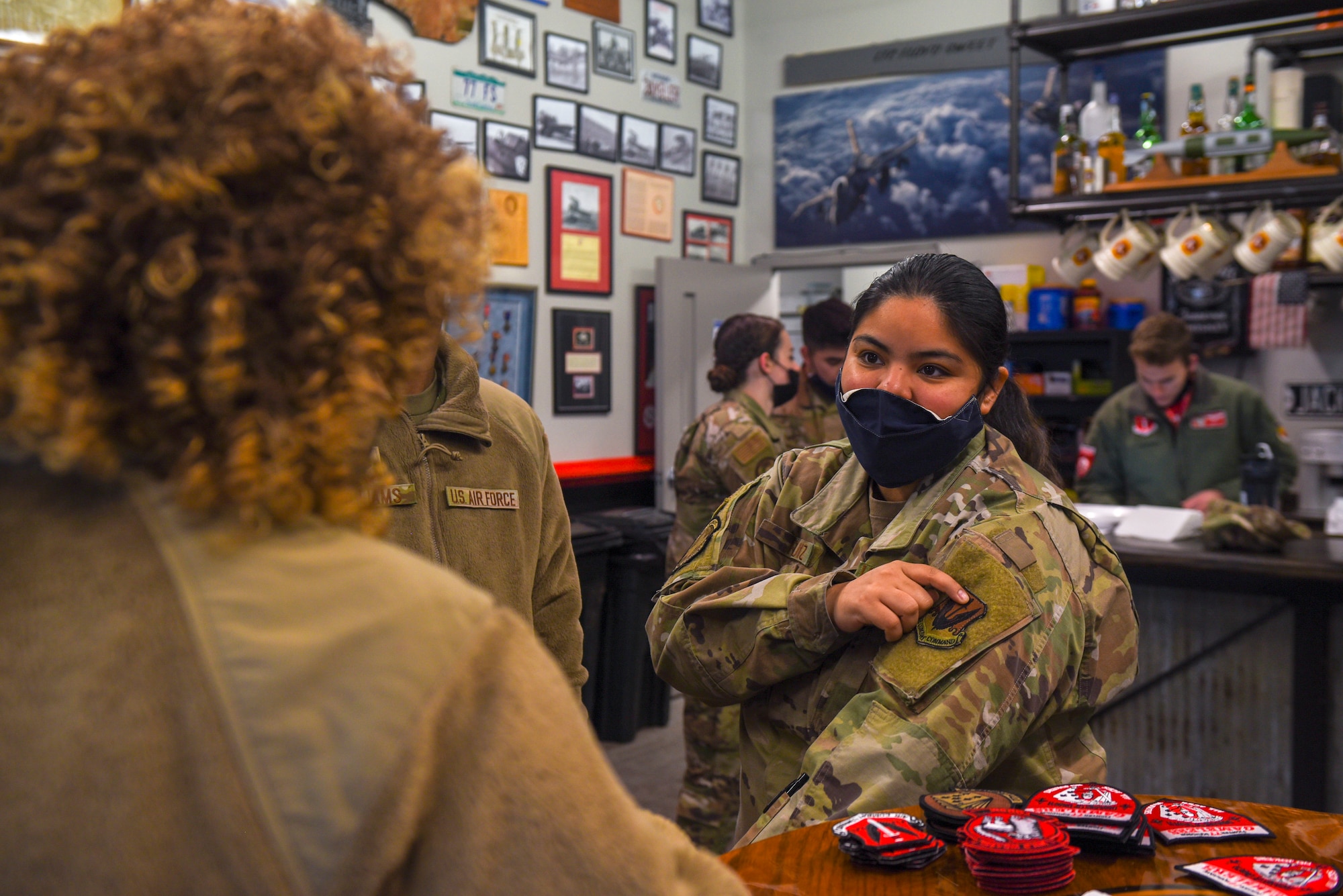 An Airman has a conversation during a tour.