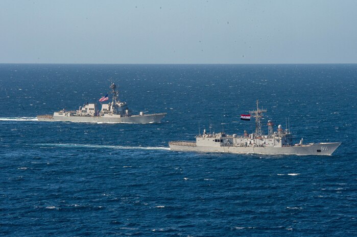 Egyptian Navy frigate ENS Alexandria (F911), right, and U.S. Navy guided-missile destroyer USS Jason Dunham (DDG 109) conduct maneuvering-operation exercises in the Red Sea during International Maritime Exercise/Cutlass Express 2022, Feb. 07, 2022.