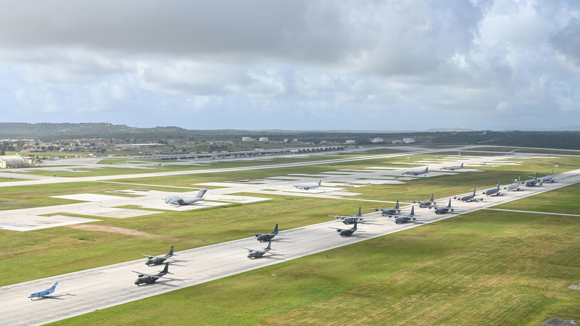 U.S. Air Force, Royal Australian Air Force, Japan Air Self-Defense Force, and regional allies and partners aircraft participate in a close formation taxi, known as an Elephant Walk, during Cope North 2022 at Andersen Air Force Base, Guam, Feb. 5, 2022.