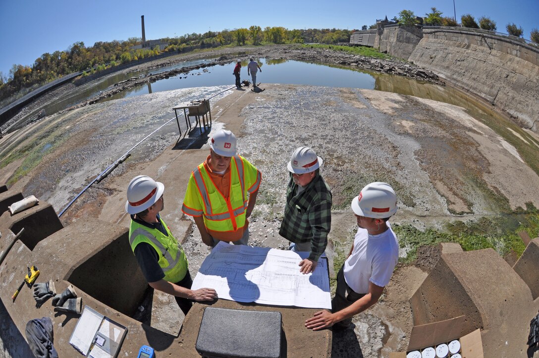 Engineers inspect dam