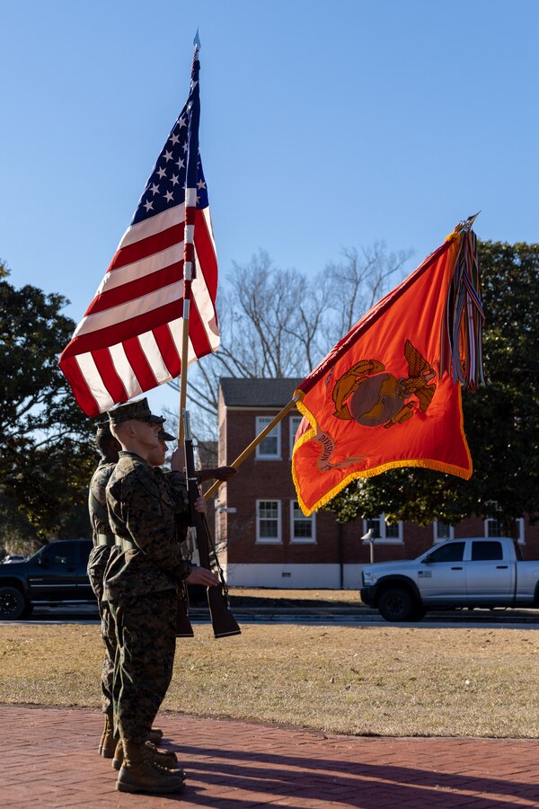 U.S. Marines with Headquarters Battalion, 2d Marine Division (MARDIV), present the colors during the 81st birthday ceremony for 2d MARDIV on Camp Lejeune, North Carolina, Feb. 1, 2022.