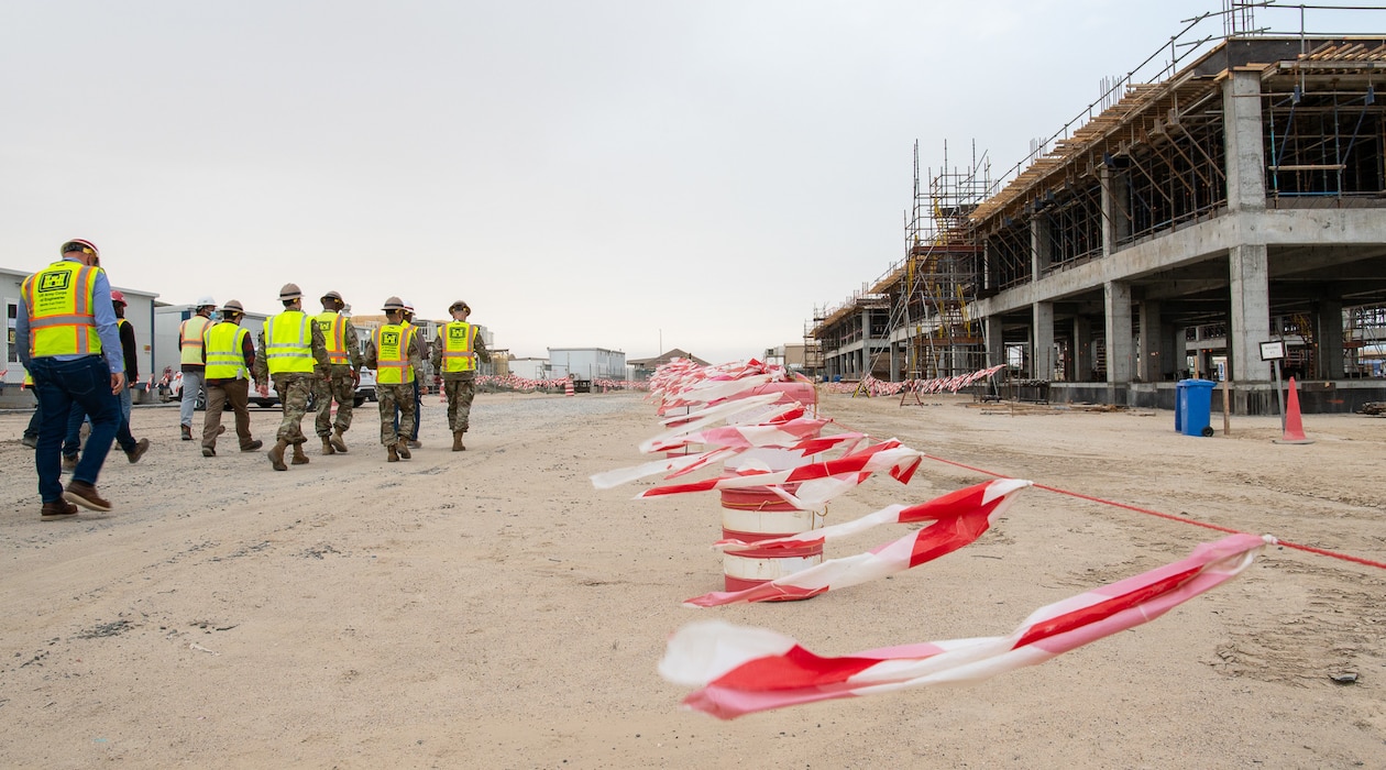 Lt. Gen. Scott A. Spellmon, the 55th Chief of Engineers and commanding general of U.S. Army Corps of Engineers, and staff, tour the construction site of the future Unaccompanied Officer’s Quarters at Camp Arifjan, Kuwait, Jan. 31, 2022. When complete the $22 million project with have four buildings and house approximately 300 personnel, significantly upgrading from existing temporary living facilities. Lt. Gen. Spellmon is in Kuwait reviewing Army Corps of Engineer projects and meeting with key leaders and staff from the Transatlantic Division's two districts, the Middle East District and Transatlantic Expeditionary District. He will also meet with senior U.S. embassy personnel along with Kuwaiti Ministry of Defense and Kuwaiti Naval officers during his key leader engagements. (U.S. Army photo by Richard Bumgardner)