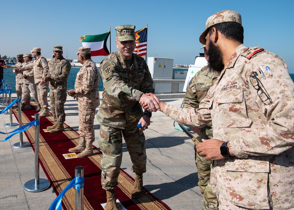 Lt. Gen. Scott A. Spellmon, the 55th Chief of Engineers and commanding general of U.S. Army Corps of Engineers, along with senior U.S. and Kuwaiti officials, cut the ceremonial ribbon opening the Kuwaiti Navy pier, Feb. 2, 2022. The renovated Navy pier and harbor house construction projects were managed by Transatlantic Division's Middle East District. Spellmon is in Kuwait reviewing Army Corps of Engineer projects and meeting with key leaders and stakeholders